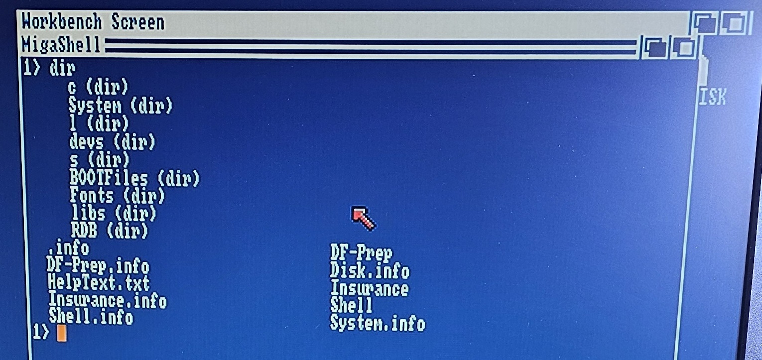 An Amiga Shell window showing the output of a dir command, listing directories c, System, l, devs, s, BOOTFiles, Fonts, libs and RDB, and files including .info, DF-Prep, DF-Prep.info, HelpText.txt, Insurance.info, Shell.info, Disk.info, Insurance, Shell and System.info